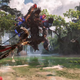 Aloy readies her bow at a giant dinosaur in Horizon Forbidden West